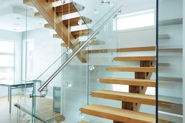 white oak mono stringer with glass railing and stainless steel handrail
